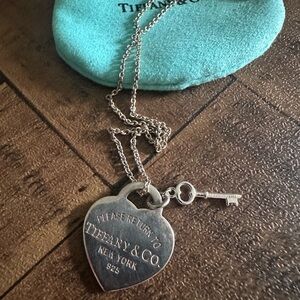 Tiffany & Co. Silver Heart Pendant with Key Charm